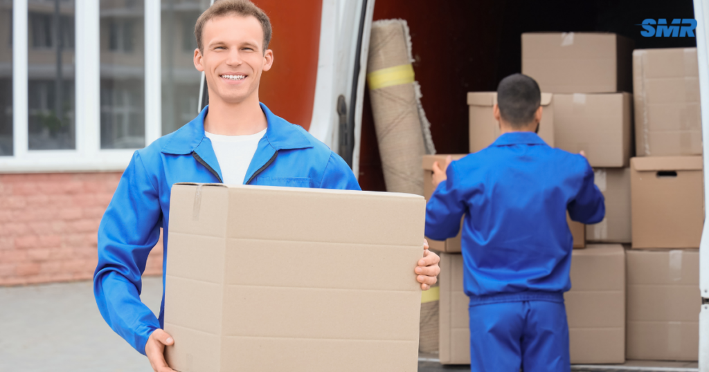 Removal van Bayswater man and van team loading wrapped boxes for affordable local removals
