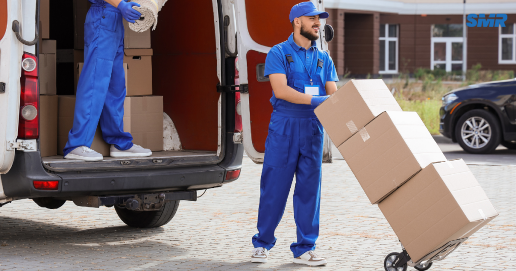 Man and Van Ealing W5 removals team loading moving boxes into a professional van