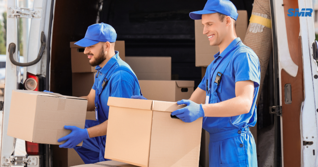 Movers transporting furniture in Kensal Green