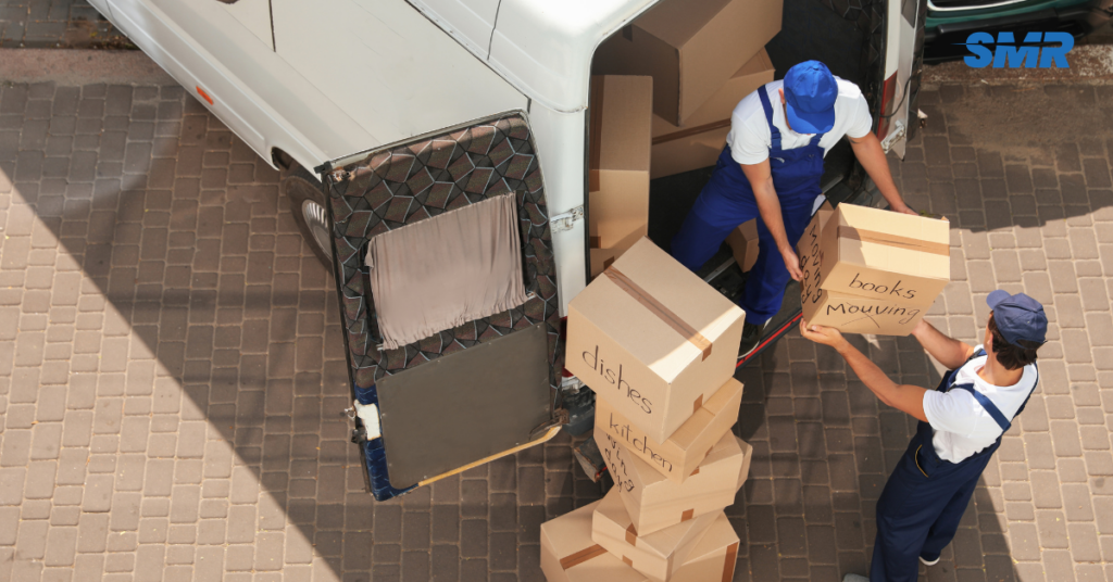 Movers with boxes and furniture in SW5