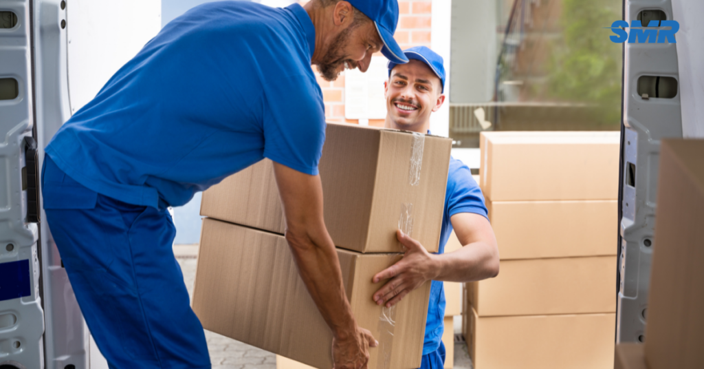 Movers handling furniture and boxes in UB11